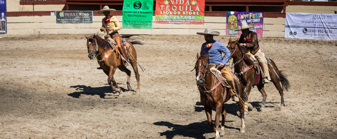 San Antonio, Texas, USA - April 21, 2024 Cowboys dressed in traditional attire on horseback